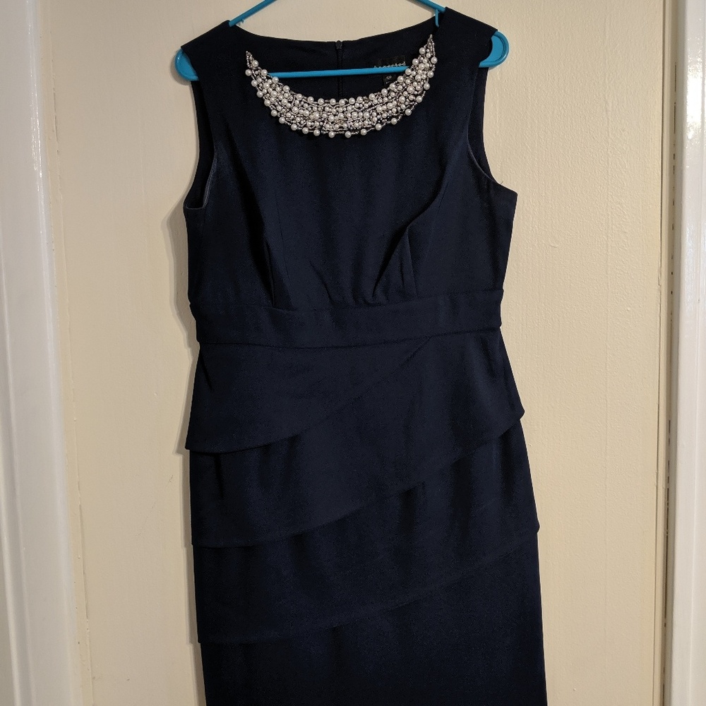 Navy blue cocktail dress with embellished neckline